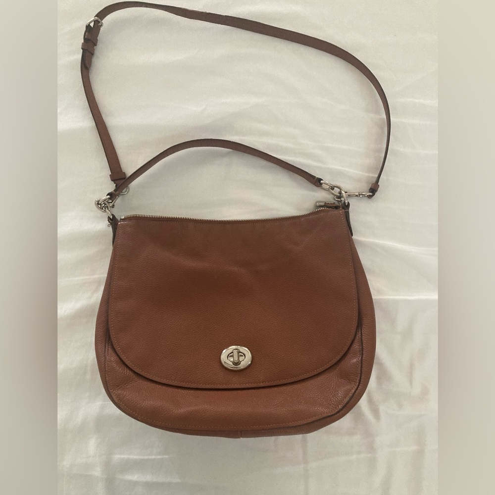 Coach leather shoulder bag with long and short strap.